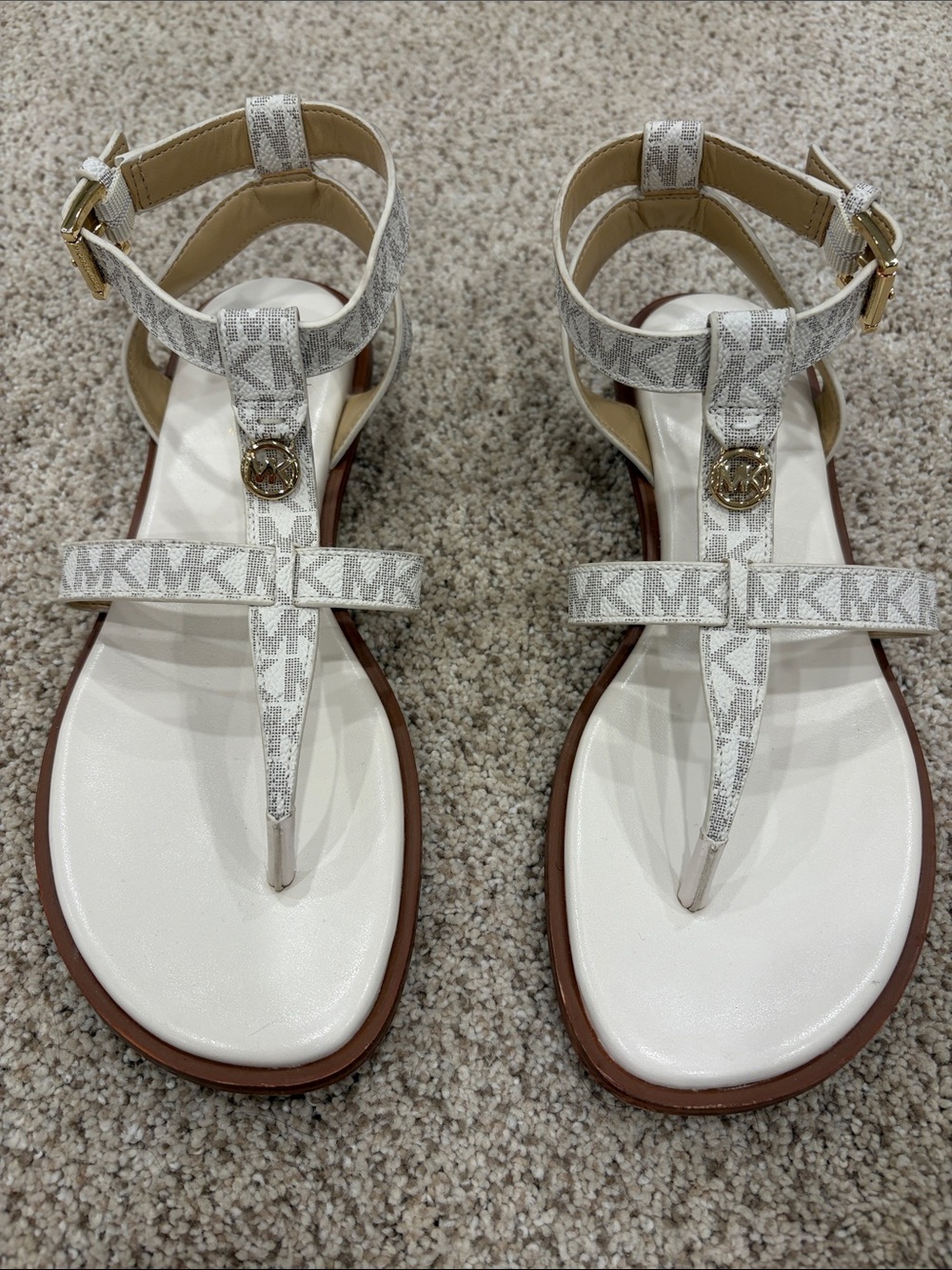 MICHAEL Michael Kors 6 1/2 cream/tan MK Logo T-Strap Sandals with Gold Accent